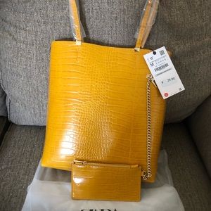 Yellow Zara over the shoulder purse